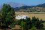 The villa seen from the distance with Grazalema mountains as backdrop 
